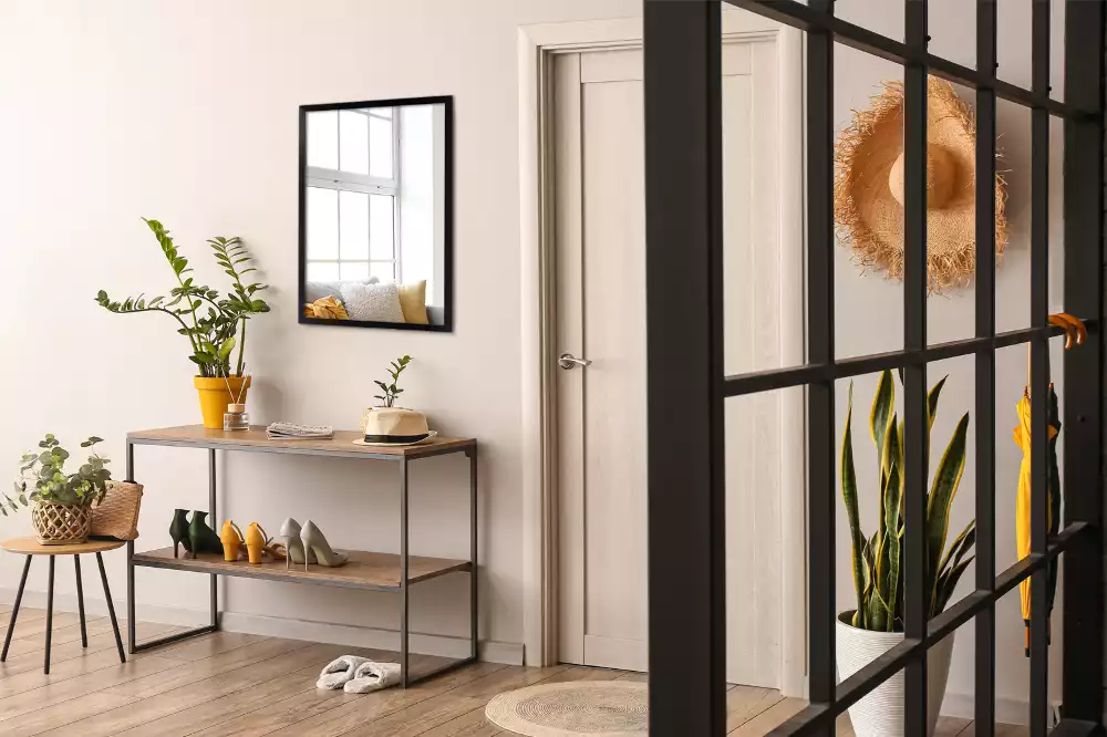 Téglalap alakú tükör fal fekete kerettel